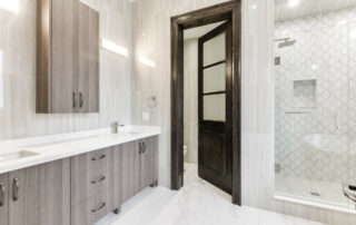 Hall's Lake Estates Luxury Model Home Bathroom Vanity Cabinets with Granite counter tops.